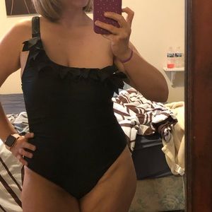 Cute black one shoulder swimsuit.